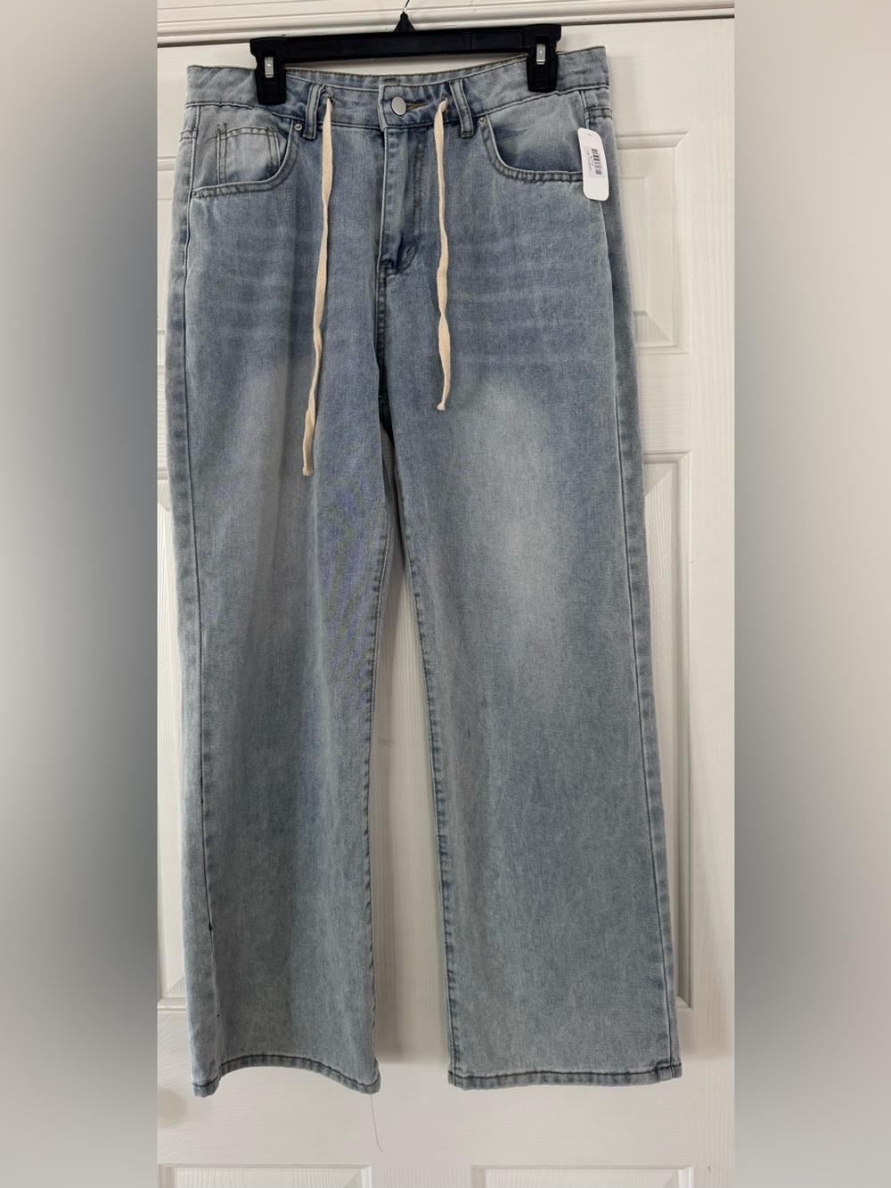 Distressed relaxed denim Women's Jeans in Light Blue Wash with Drawstring Waist